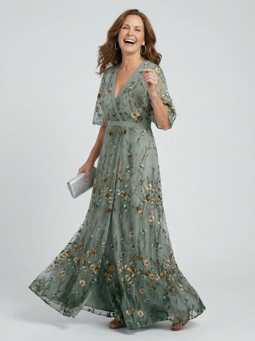 VESTIDO LARGO FLUIDO DE CUELLO HALTER CON ESTAMPADO FLORAL