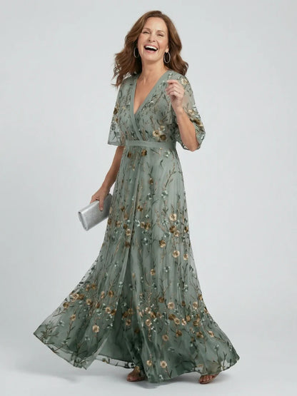 VESTIDO LARGO FLUIDO DE CUELLO HALTER CON ESTAMPADO FLORAL
