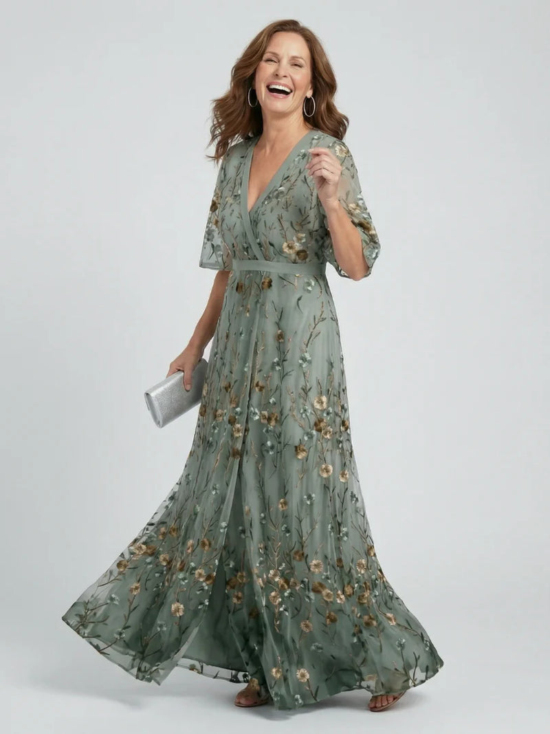 VESTIDO LARGO FLUIDO DE CUELLO HALTER CON ESTAMPADO FLORAL